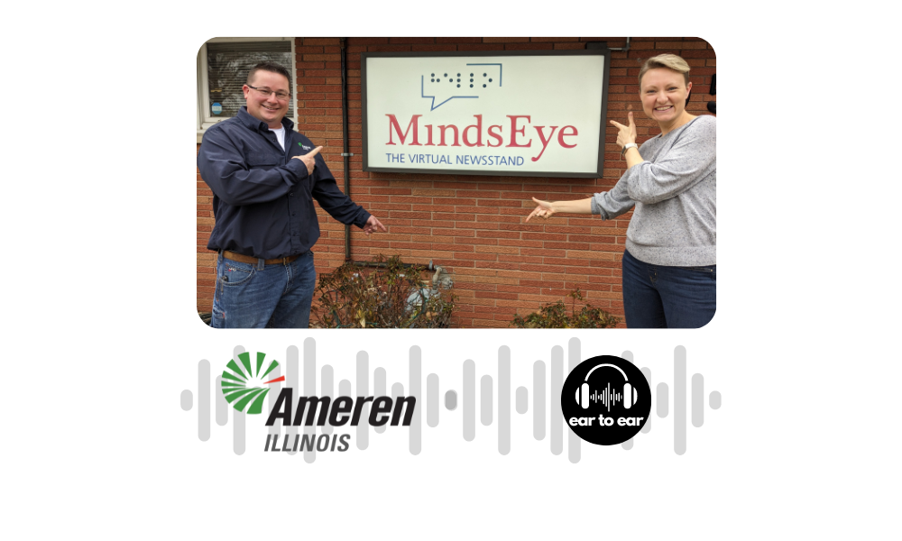 Banner: Ameren IL and Ear to Ear logos, photo of Jake and Laura smile in front of the MindsEye Studio sign. They each point to the sign and to the natural gas meter just below it