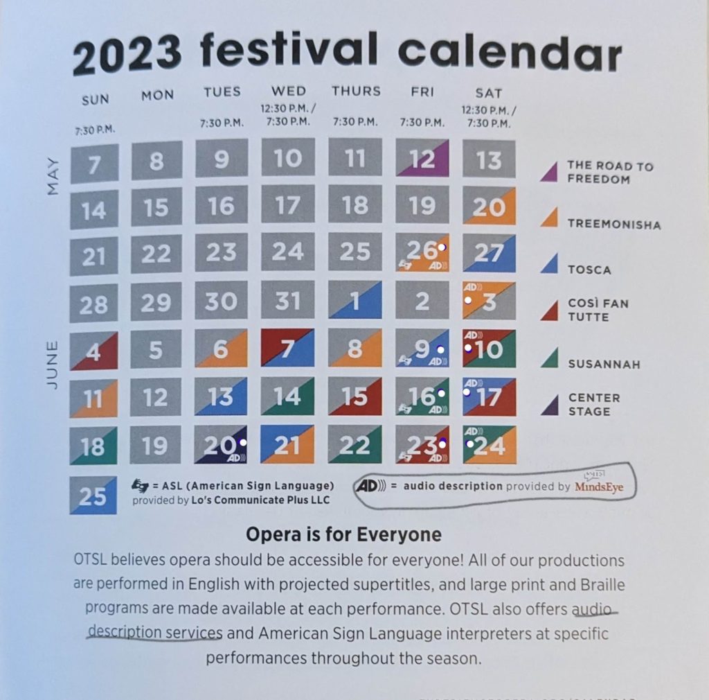 A marked-up photo of the newest O T S L mailer with a calendar of the upcoming 2023 festival season. Nine days have the Audio Description symbol for the operas Treemonisha, Tosca, Cosi Fan Tutte, Susannah, and Center Stage with the title Opera is for Everyone.